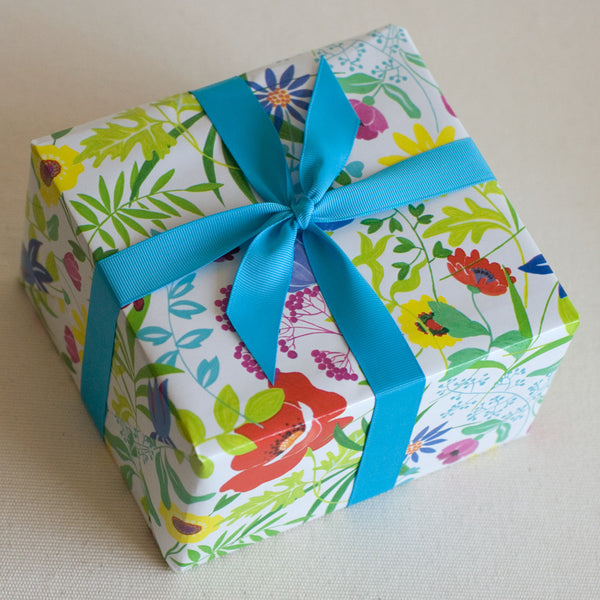 GIFT: 4 jars, wrapped in "FLOWERS" gift wrap