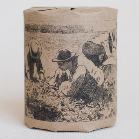 "The Strawberry Bed" gift wrap features art depicting people harvesting strawberries, originally an engraving (black print on kraft paper)